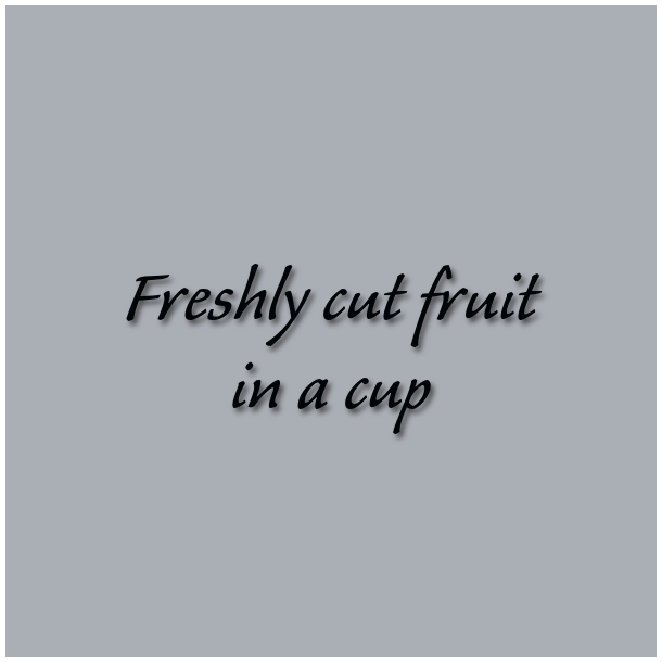 Freshly cut fruit in a cup